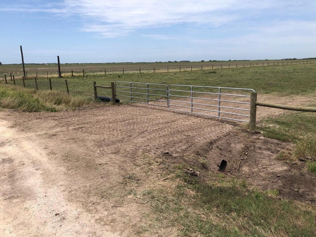 A gate at the front of a ranch in Texas.